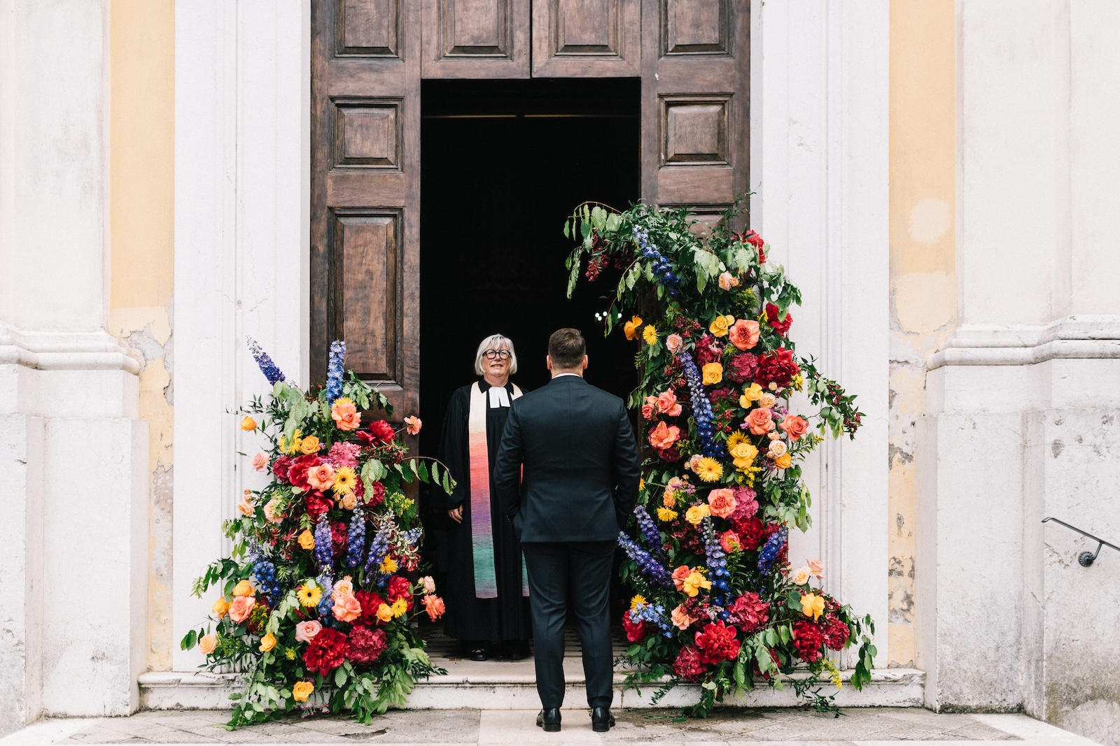 Destination Wedding Castello Oldofredi churchgroomcelebrantcolorful flowers