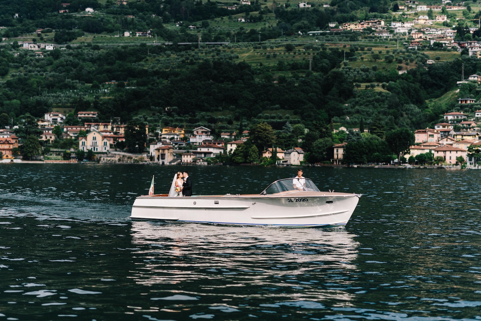 Destination Wedding Castello Oldofredi couple session on the boat