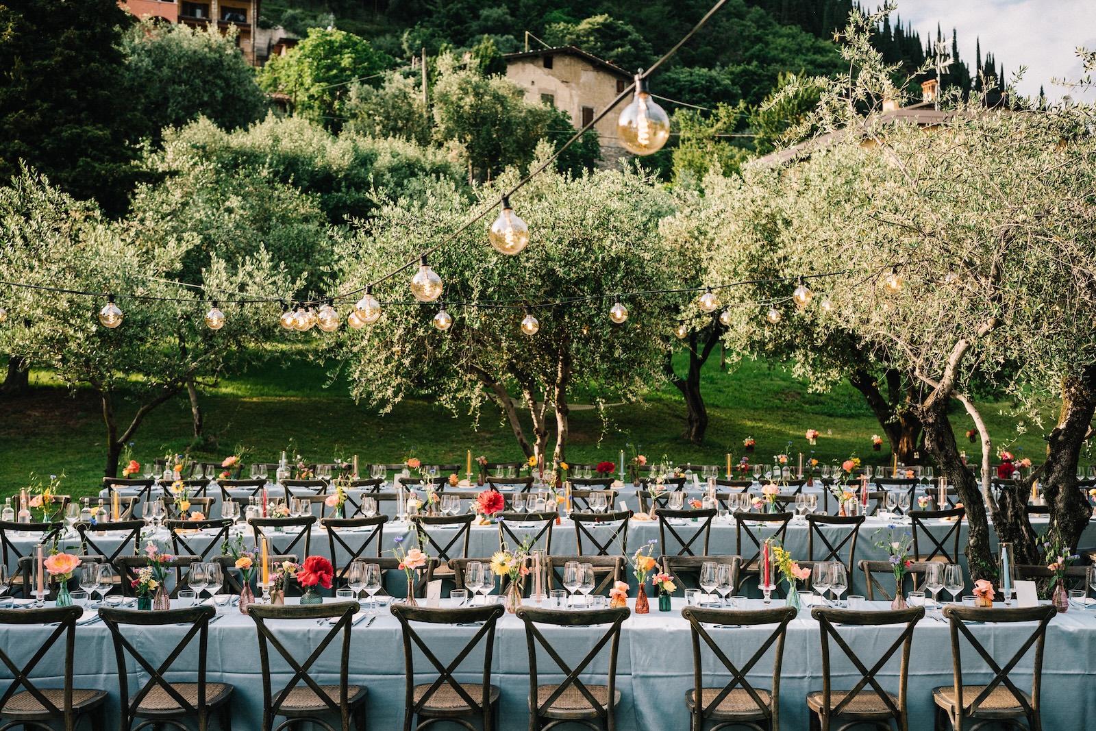 Destination Wedding Castello Oldofredi table settingcolorful flowers